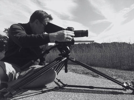 Filmmaker Stanley Preston filming at Greystone golf course.